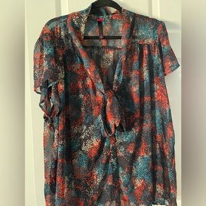 Target Size 4. Fits 24/26. Sheer tie neck top.
